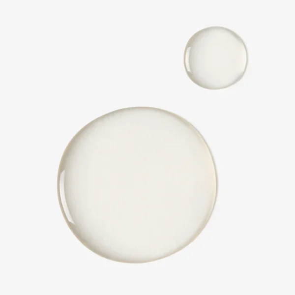 One large clear liquid droplet next to a small clear liquid droplet on a white background.