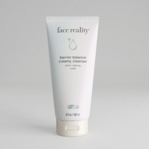 White six ounce bottle of Face Reality barrier balance creamy cleanser product with acne-safe stamp on bottle standing alone on a light grey background.