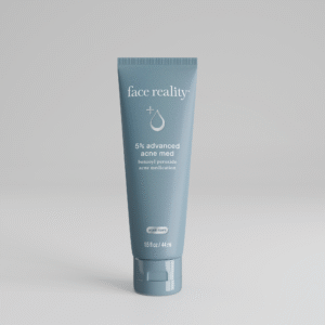 Grey blue 1 point 5 ounce bottle of Face Reality 5% advanced acne med product with acne-safe stamp on bottle standing alone on a light grey background.