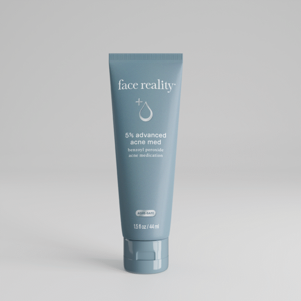 Grey blue 1 point 5 ounce bottle of Face Reality 5% advanced acne med product with acne-safe stamp on bottle standing alone on a light grey background.