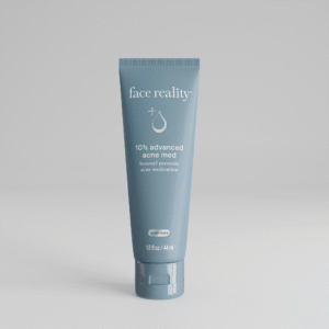 Grey blue 1 point 5 ounce bottle of Face Reality 10% advanced acne med product with acne-safe stamp on bottle standing alone on a light grey background.