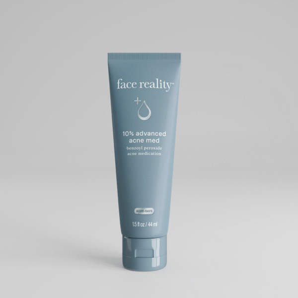 Grey blue 1 point 5 ounce bottle of Face Reality 10% advanced acne med product with acne-safe stamp on bottle standing alone on a light grey background.