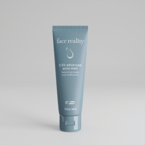Grey blue 1 point 5 ounce bottle of Face Reality 2.5% advanced acne med product with acne-safe stamp on bottle standing alone on a light grey background.