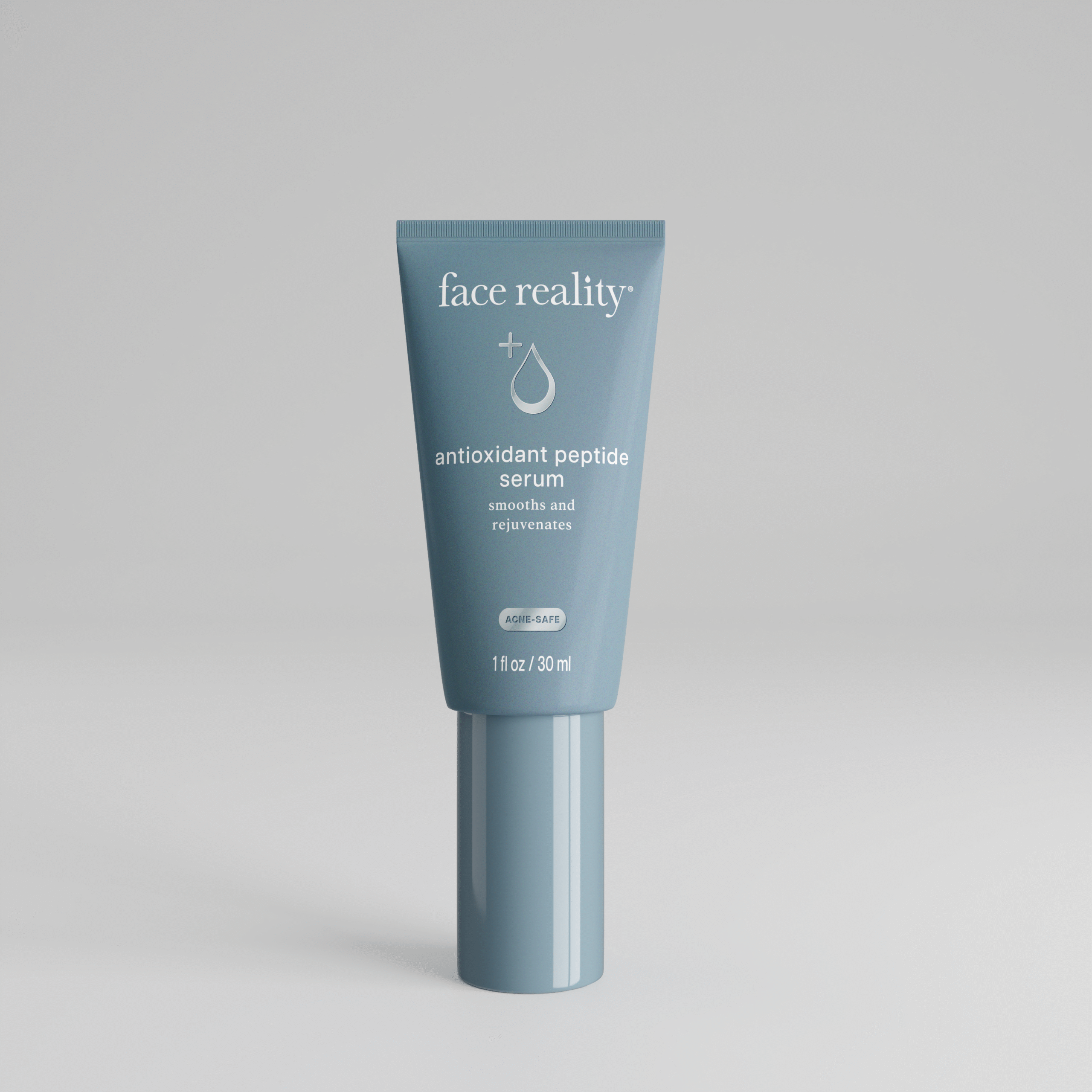 Grey blue one ounce bottle of Face Reality antioxidant peptide serum product with acne-safe stamp on bottle standing alone on a light grey background.